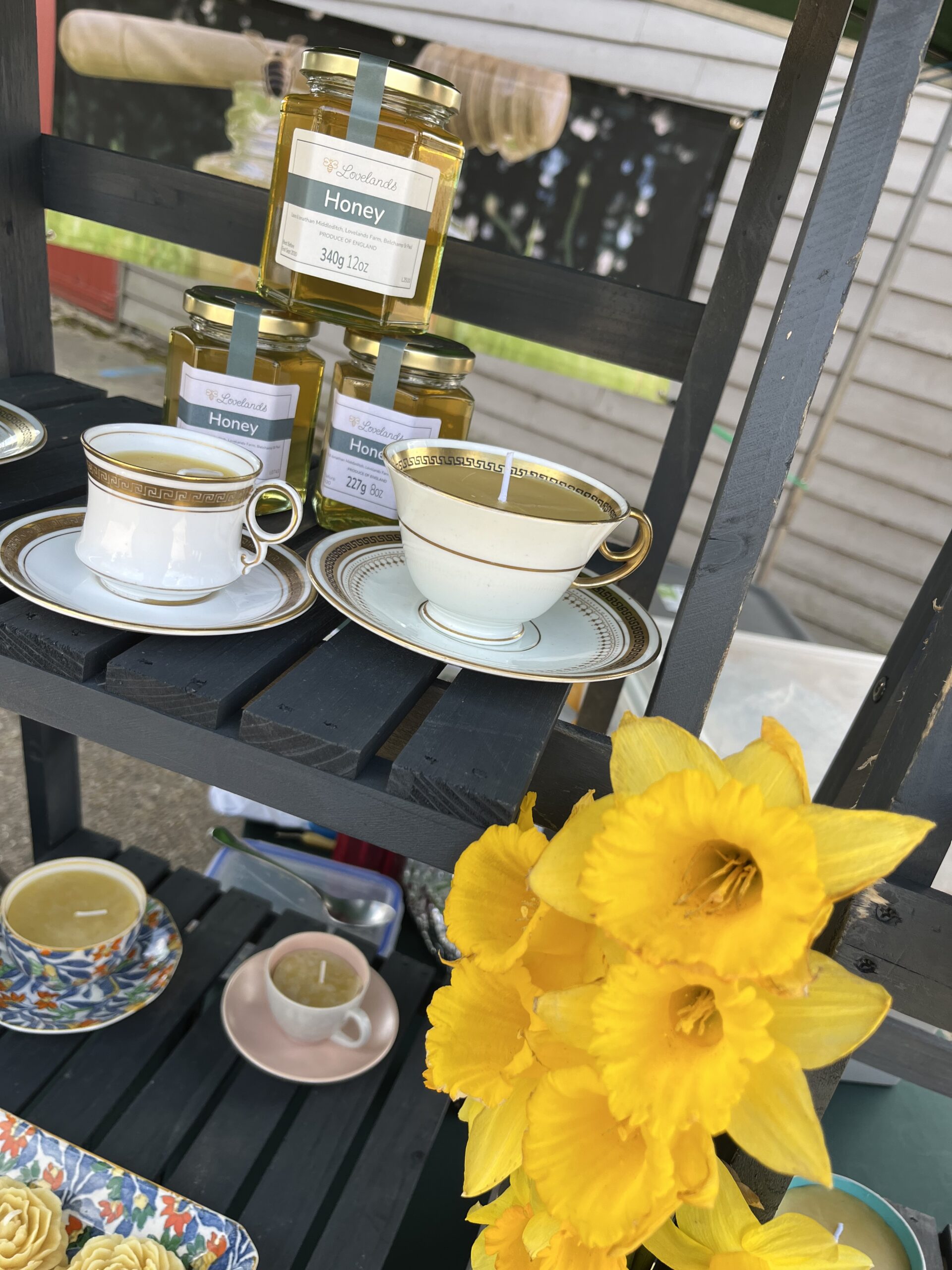 Lovelands honey on the market stall with vintage teacups