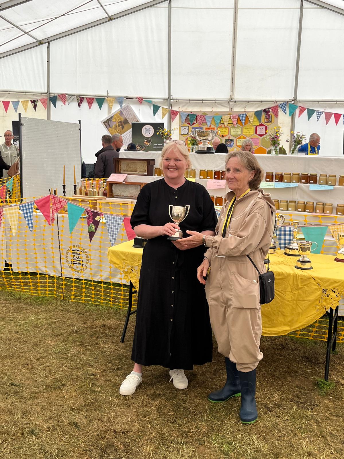 Laura receiving a beekeeping award